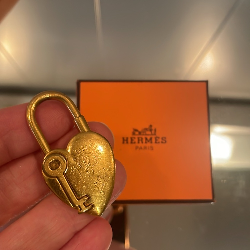 Hermes Vintage Gold Heart gold plate.  Lock with key charm